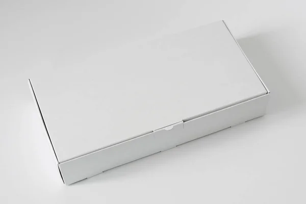 Een lege witte doos maquette — Stockfoto