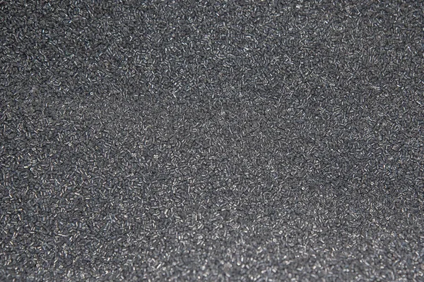 Gray plastic polymer pellets textures — Stock Photo, Image