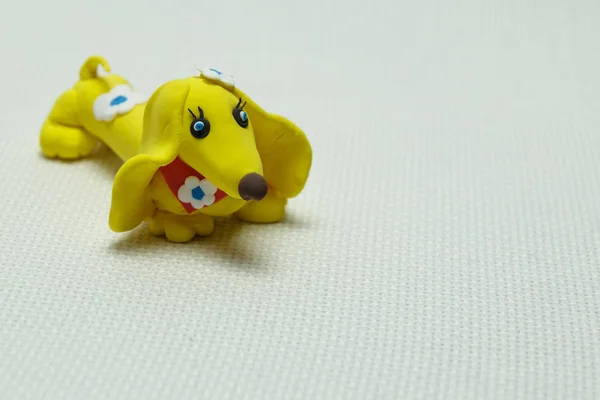 Cão um brinquedo feito de plasticina — Fotografia de Stock