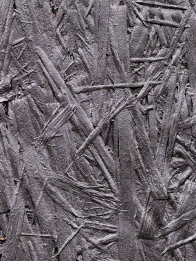 Gri-gümüş talaşla boyanmış ezilmiş ve boyanmış arka plan.