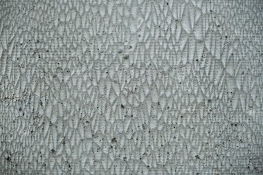 Sivri desenli ve bulanık kenarlı beton arka plan. Gri beton doku.