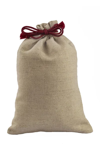 Dekoratif çanta, beyaz arka planda izole edilmiş kaba kumaştan bir dantelle bağlanmış..