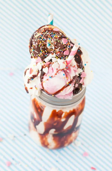 Creamy overstuffed milkshake — Stock Photo, Image