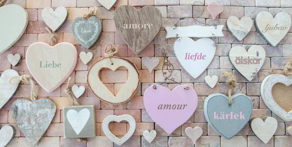 Variety of hearts on stone background — Stock Photo, Image