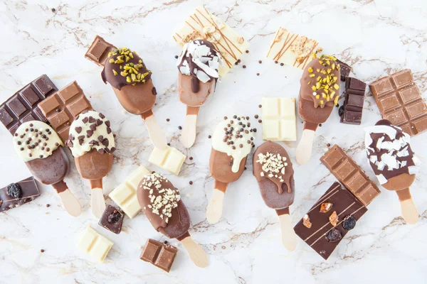 Frozen popsicles with chocolate — Stock Photo, Image