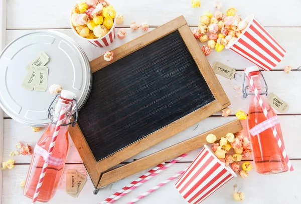 Colorful popcorn in striped cups — Stock Photo, Image