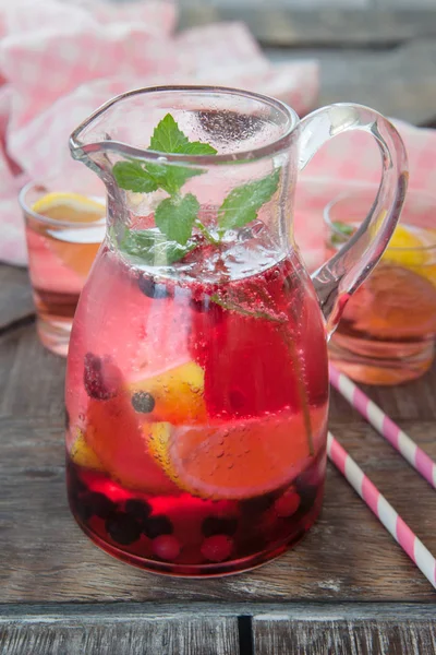 Pink lemonade with lemon — Stock Photo, Image