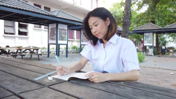 Cute Asian Thai High School Girl Uniform Having Fun Homework — стоковое видео