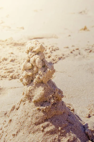 Sand heap on beach — Stock Photo, Image