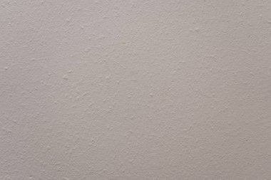 Gri arkaplan. Boyalı duvar dokusu. Yer ile arkaplan veya doku, metin için boşluk. 