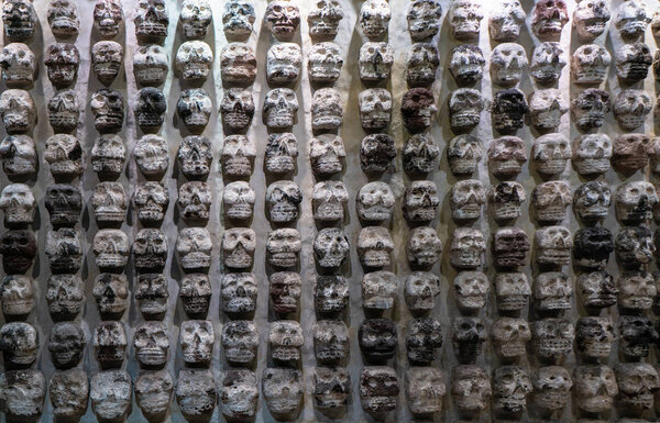 Fragment of Greater Temple (Templo Mayor). Skull Rack. Detail of ancient aztec ruins. Travel photo. Structure of old walls. Mexico city.