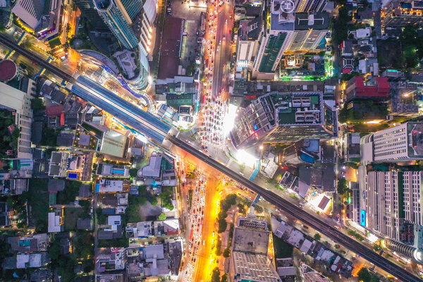 Aerial view of Asoke intersection and sky train station in Bangkok Thailand. Terminal 21 mall and grande centre point, bts asoke and traffic.
