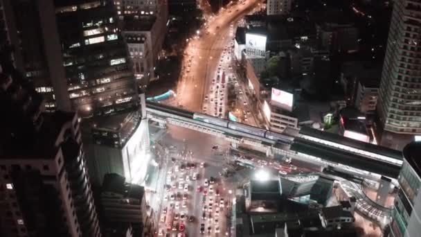 Aerial view of Asoke intersection and sky train station in Bangkok Thailand — Stock Video