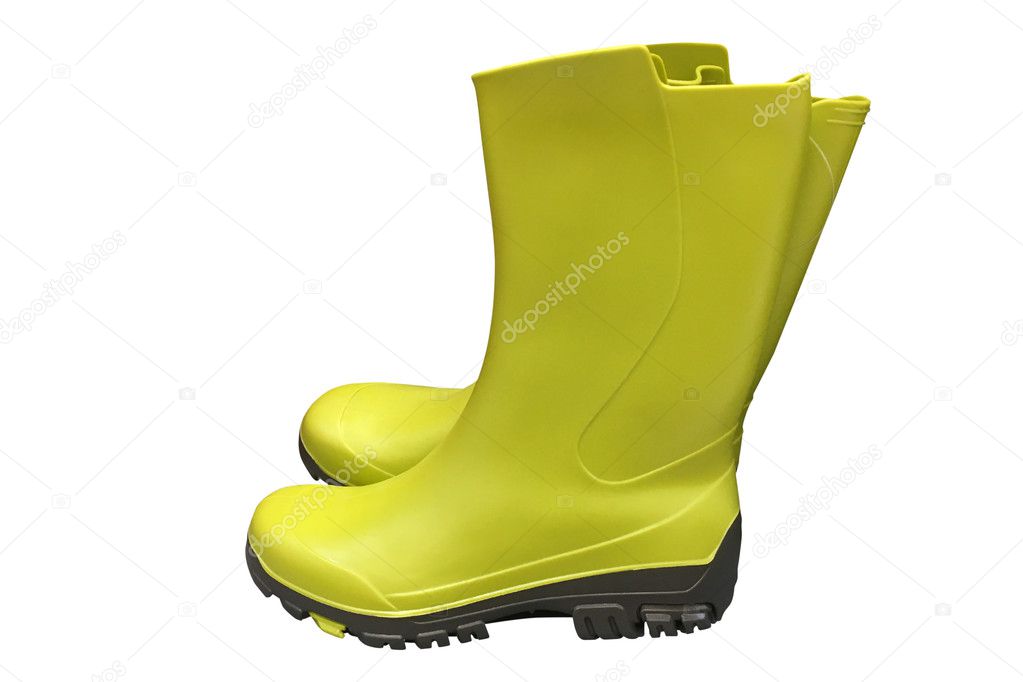 green rubber boots isolated on white background