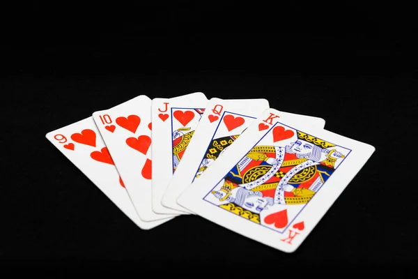 Carte da gioco per il poker su sfondo nero — Foto Stock