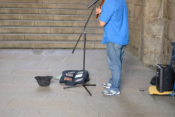 Street musician with a wind instrument — Stock Photo, Image