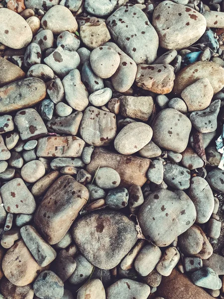 Sfondo spiaggia di ghiaia, pavimento in pietra. Natura astratta ciottoli ba — Foto Stock