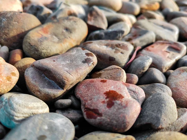 Kieselstrand Hintergrund, Steinboden. abstrakte Naturkiesel ba — Stockfoto