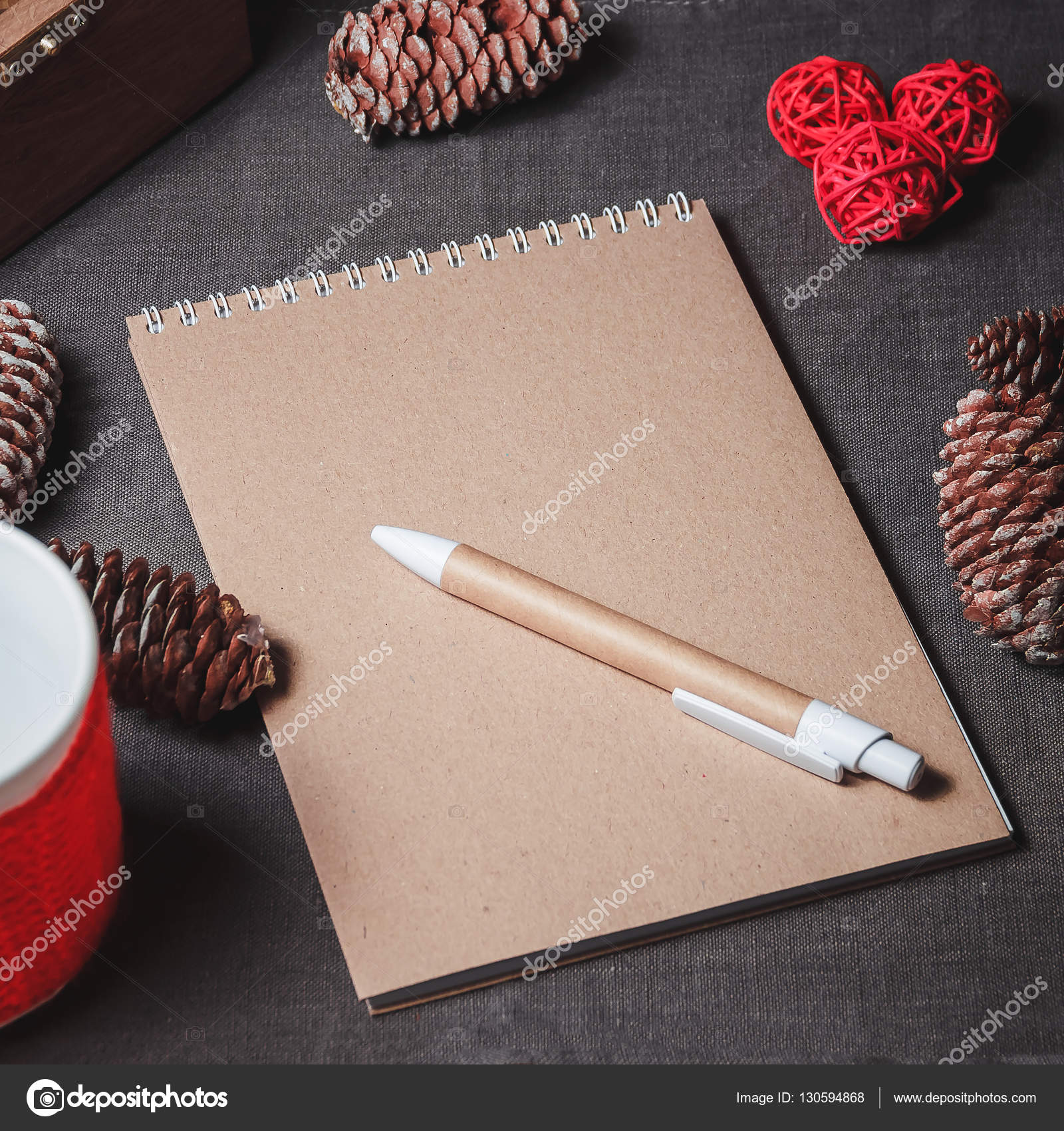 Notebook In The Center Of Cute Christmas Decoration Cones Stock