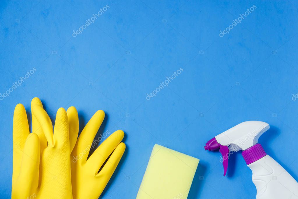 Cleaning Products. Home Cleaning Concept. Blue Background. Place for Typography and Logo. Copy space. Flat Lay. Top View