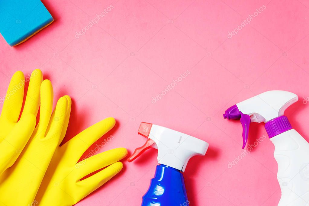 Cleaning Products. Home Cleaning Concept. Pink Background. Place for Typography and Logo. Copy space. Flat Lay. Top View