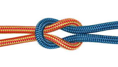 reef knot, yellow and blue ropes.  clipart