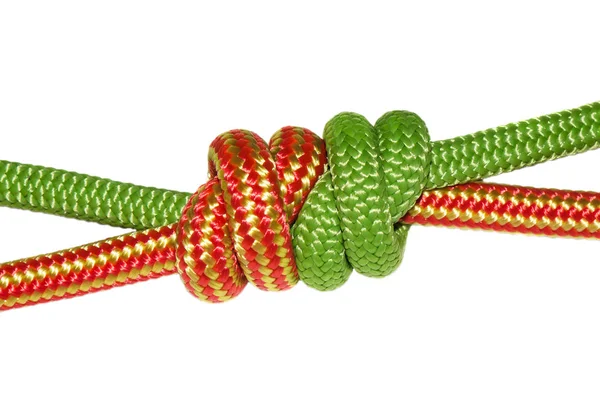Weinrebenknoten, grünes und orangefarbenes Seil. — Stockfoto