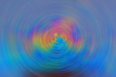 Radyal bulanıklığı olan parlak, fütürist, çok renkli bir arka plan. Çünkü... 