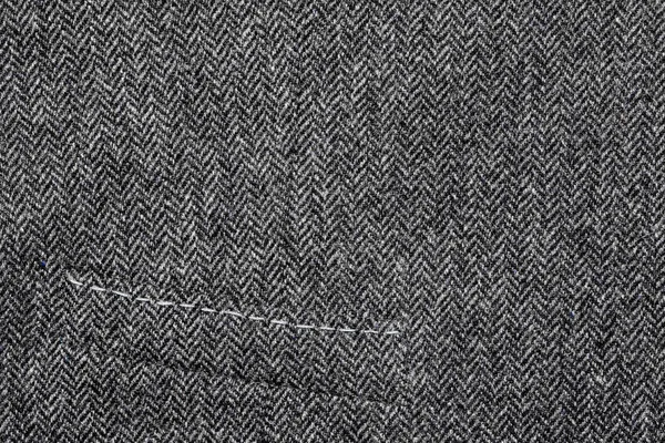 Fragment av en ylleväst med ficka. Närbild — Stockfoto