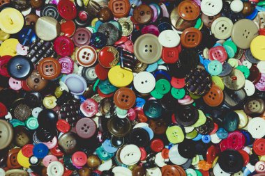 Background of colored buttons. Buttons of different sizes and colors.