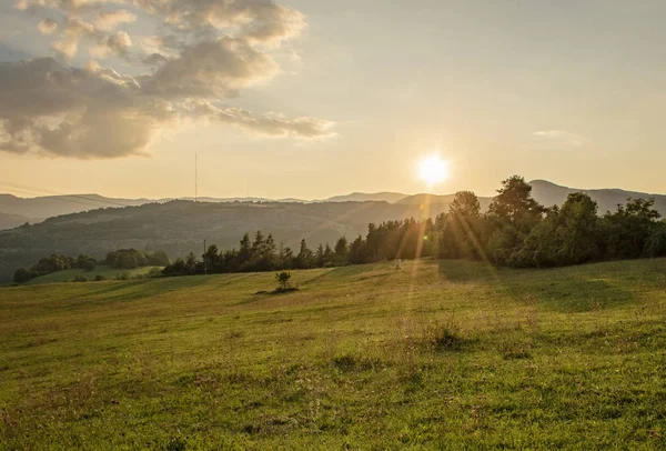 Natural summer landscape. Sunset over mountains Banska Bystrica