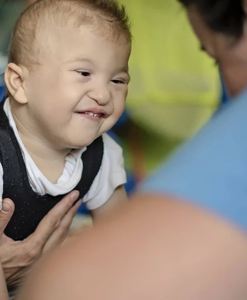 Portrait of a baby with cerebral palsy on physiotherapy — 스톡 사진