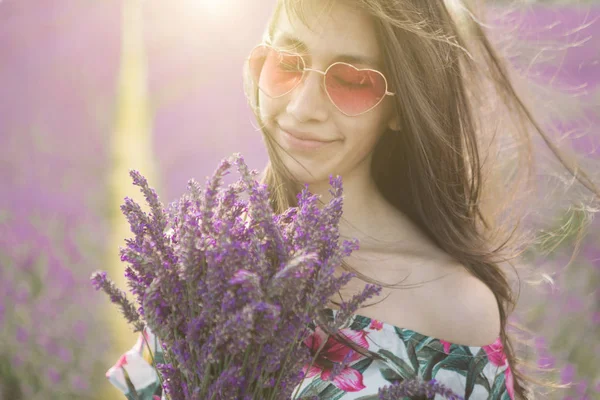 Closed eyes. Heart shaped pink glasses. Summer sunset light — Stock Photo, Image