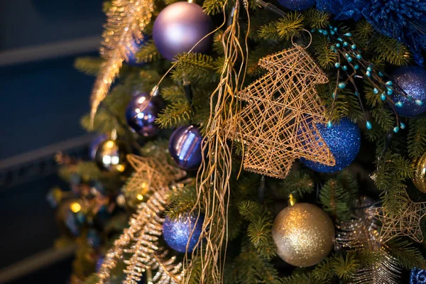 Close up Christmas tree decorated with blue ornaments and lights, xmas decorations — Stock Photo, Image