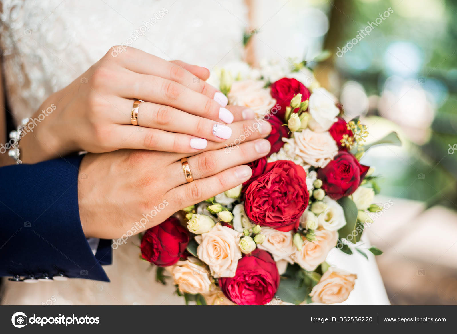Hands of bride and groom with rings on wedding Marriage