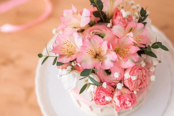 close-up of flowers on a cake.