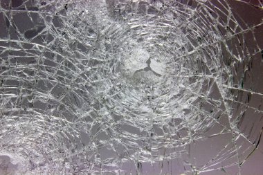 Koyu arkaplanda cam kırıkları var.