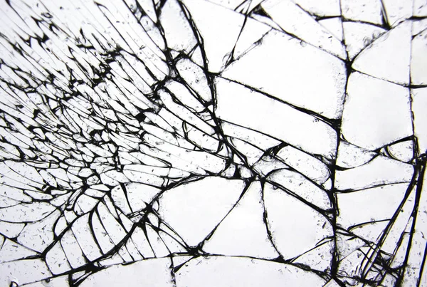 Cracks and lines on broken glass from impact. — Stock Photo, Image