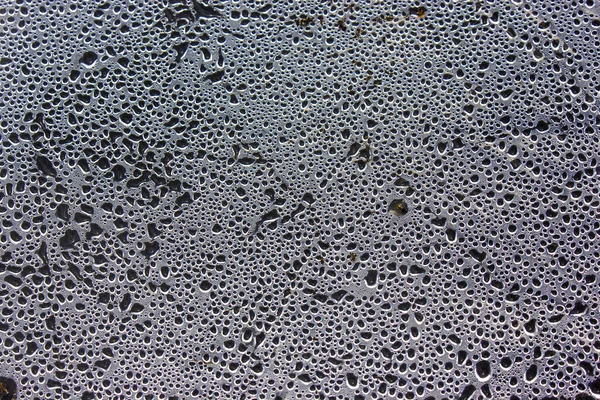 Gotas Agua Película Plástico Foto Cerca Agua Superficie —  Fotos de Stock