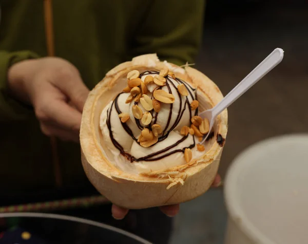 coconut ice cream with chokolate frosting close up photo