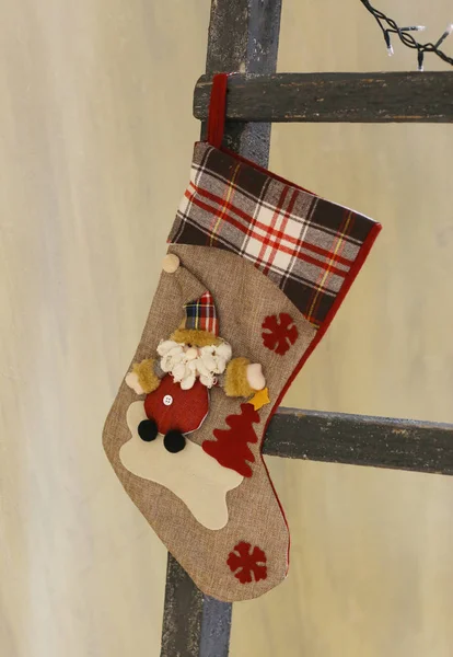 Christmas stocking hang on ladder close up photo — Stock Photo, Image