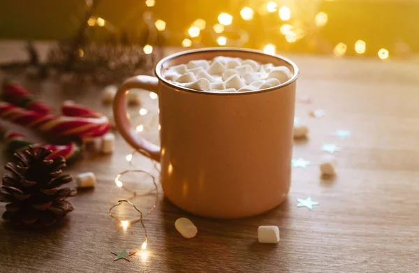 Christmas moody picture with pink cup of coffee with marshmallows and confetti — Stock Photo, Image