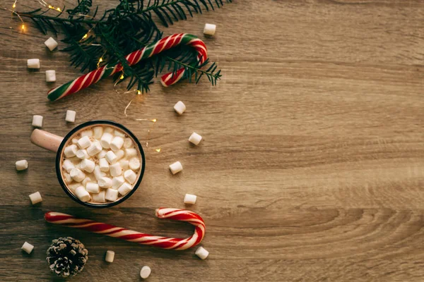 Christmas flat lay with pink cup of coffee with marshmallows and candies — Stock Photo, Image