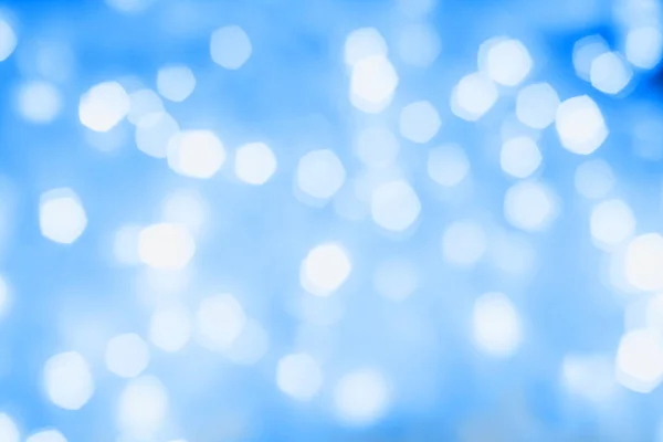 Blurred blue sparkling festive bokeh background. Trendy 2020 year color — Stock Photo, Image