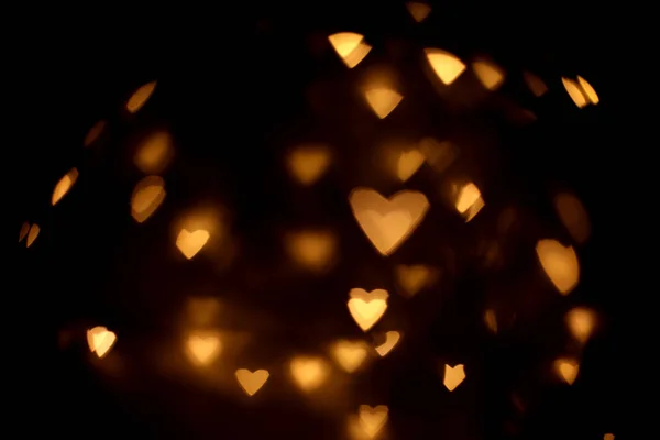 Sovrapposizione sfondo sfocato di cuori d'oro bokeh, per biglietto di San Valentino o vacanze — Foto Stock