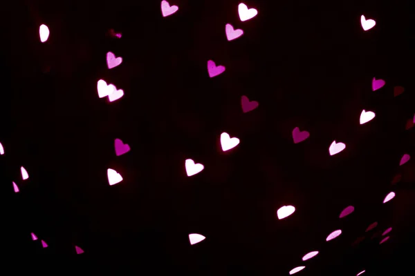 Overlay fundo embaçado de corações roxos bokeh, para cartão de Dia dos Namorados ou feriados — Fotografia de Stock