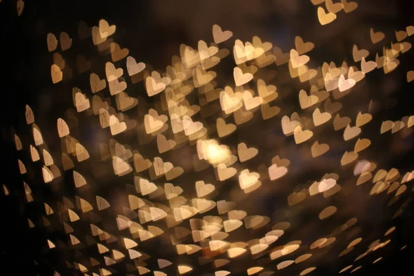 Sovrapposizione sfondo sfocato di cuori d'oro bokeh, per biglietto di San Valentino o vacanze — Foto Stock