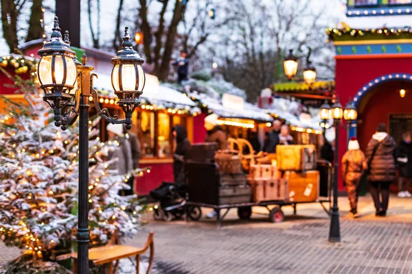 Vintage street lamp on Christmas street decoration background