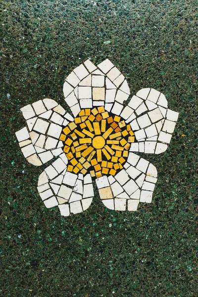 Fragment of an ancient floor floral mosaic, mosaic tiled floor