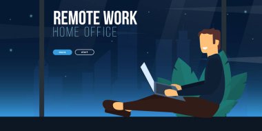 Laptoplu yakışıklı bir adam geceleri panoramik pencerelerin önünde yerde oturuyor. Merkez ofis. Serbest konsept.